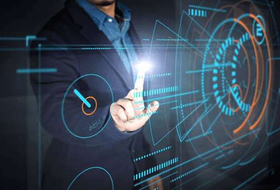 Person using virtual interface with touch interaction and holographic display.